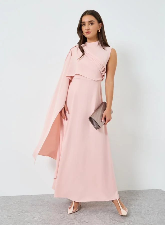 ستايلي فستان طويل بأكمام طويلة وتصميم كيب وواسع من الأسفل